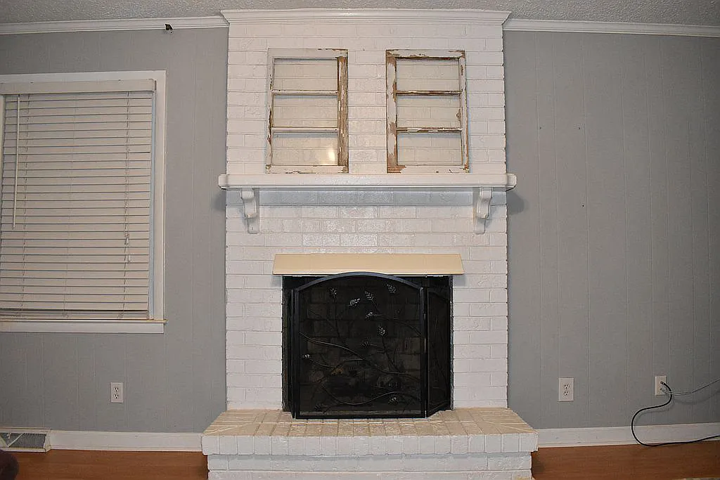 4509 Doncaster Dr - Family Room Painted Brick Fireplace and Wood Floors