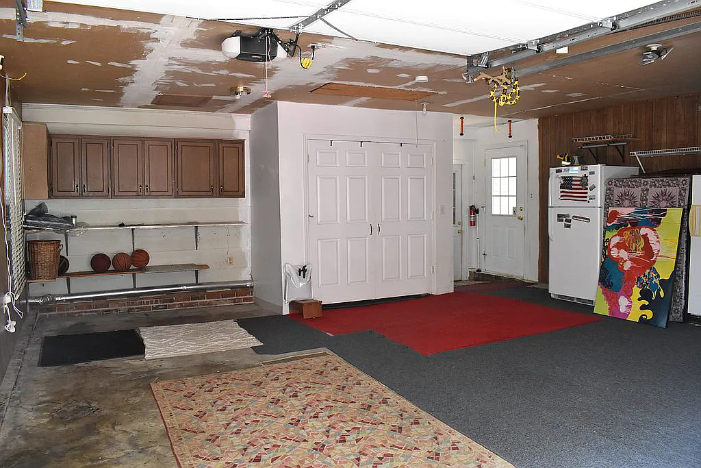 4509 Doncaster Dr - Attached 2-Car Garage with Storage Cabinetry, Pull-Down Attic with Floor, and Laundry Closet